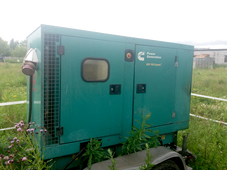 БУ дизельный генератор Cummins C55D5 в кожухе - фото