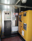 БУ дизельный генератор Caterpillar C18 в контейнере с АВР - фото