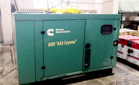 БУ дизельный генератор Cummins C80D5 в кожухе - фото