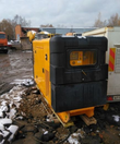 БУ дизельный генератор JCB 55qx в кожухе - фото